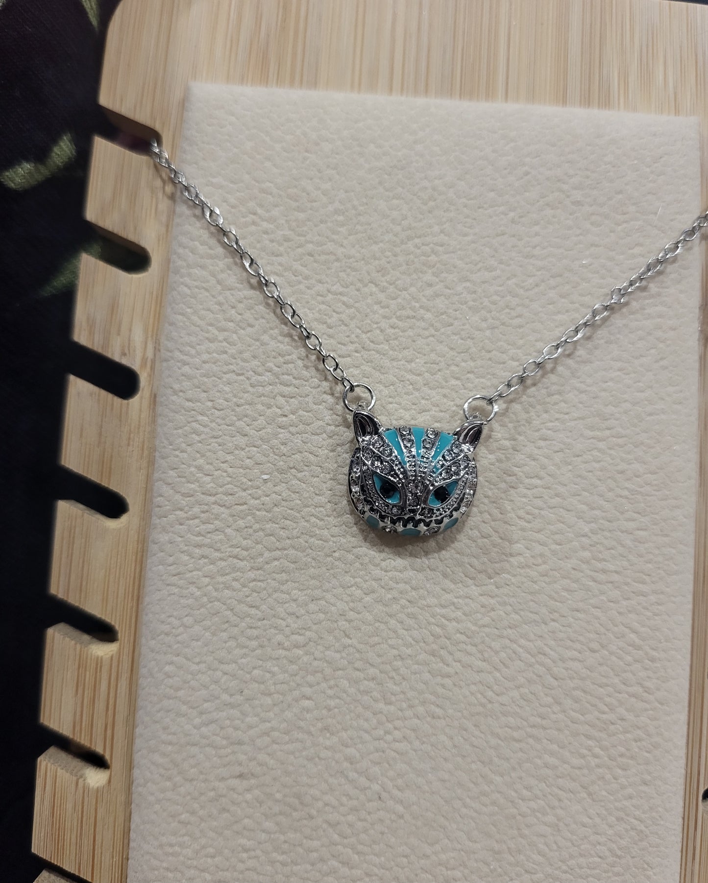Collar gato sonriente