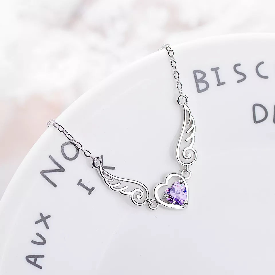 Colgante alas corazón morado plata 925