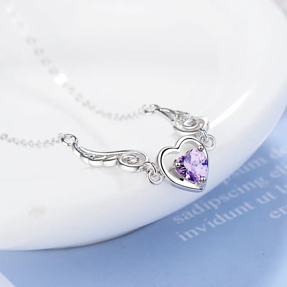 Colgante alas corazón morado plata 925