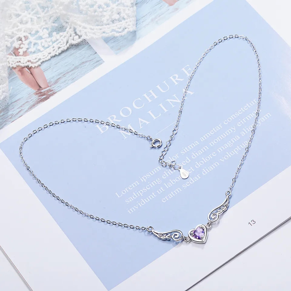 Colgante alas corazón morado plata 925