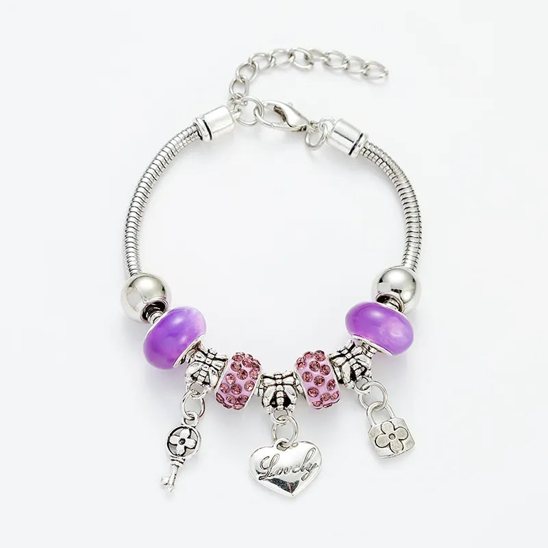 PULSERA ESTILO PANDORA GEMAS MORADAS