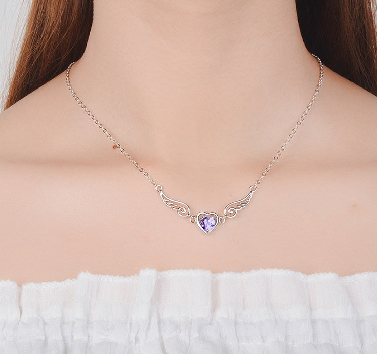 Colgante alas corazón morado plata 925